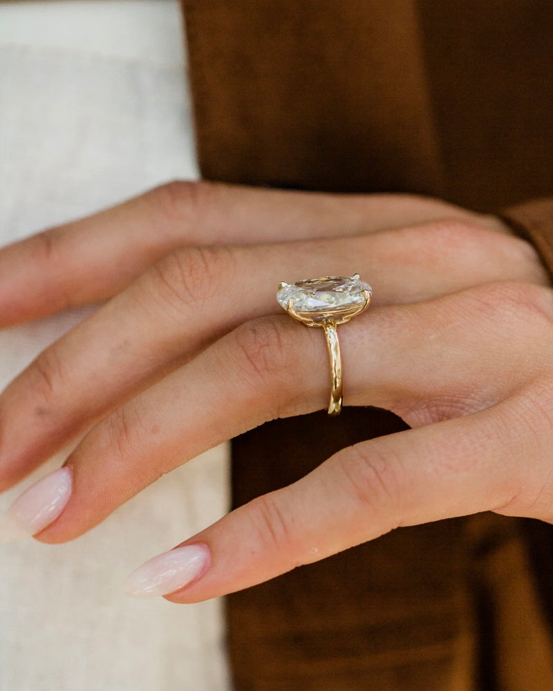 TATUM RING 7.06 CARAT CUSHOVAL
